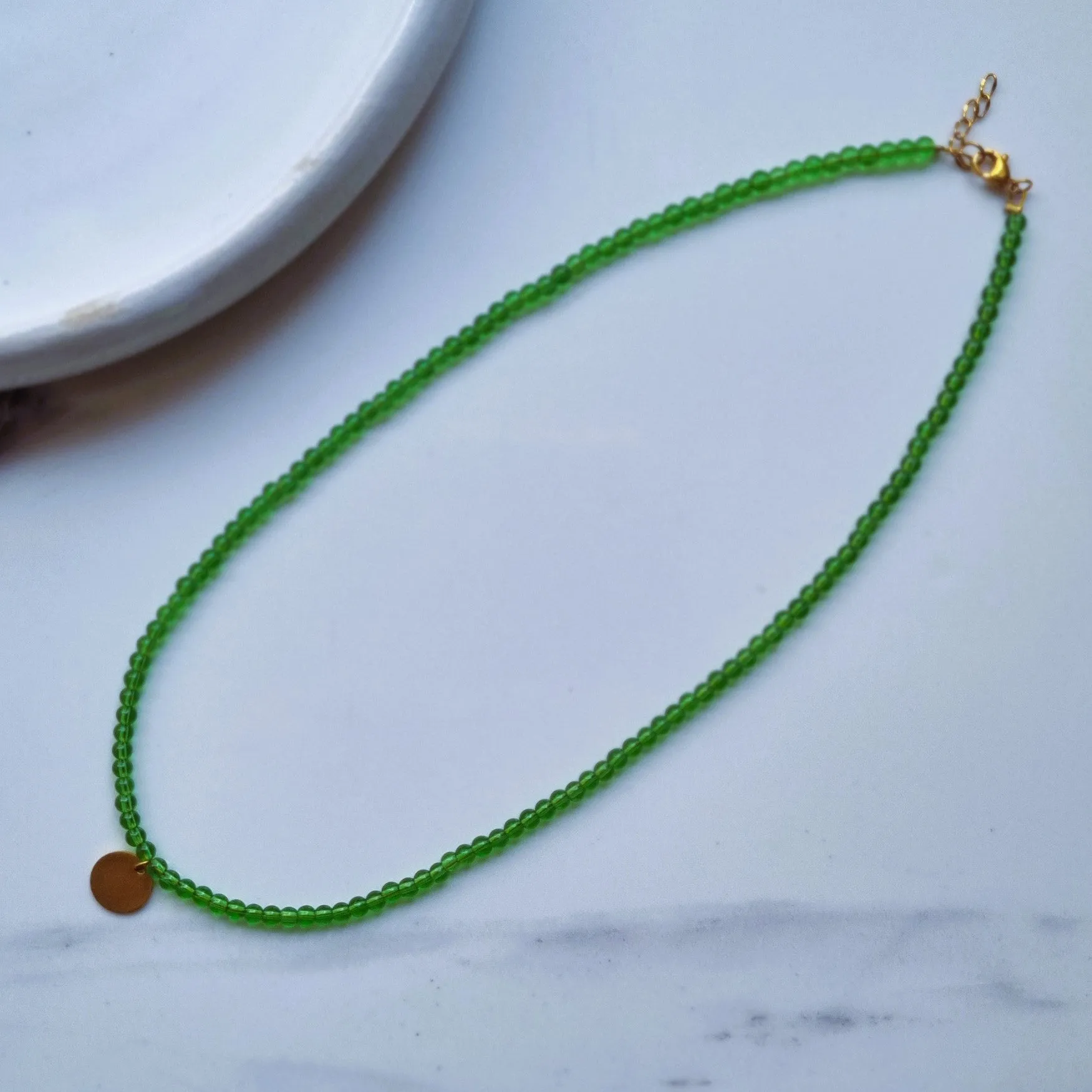 Transparent green beads necklace