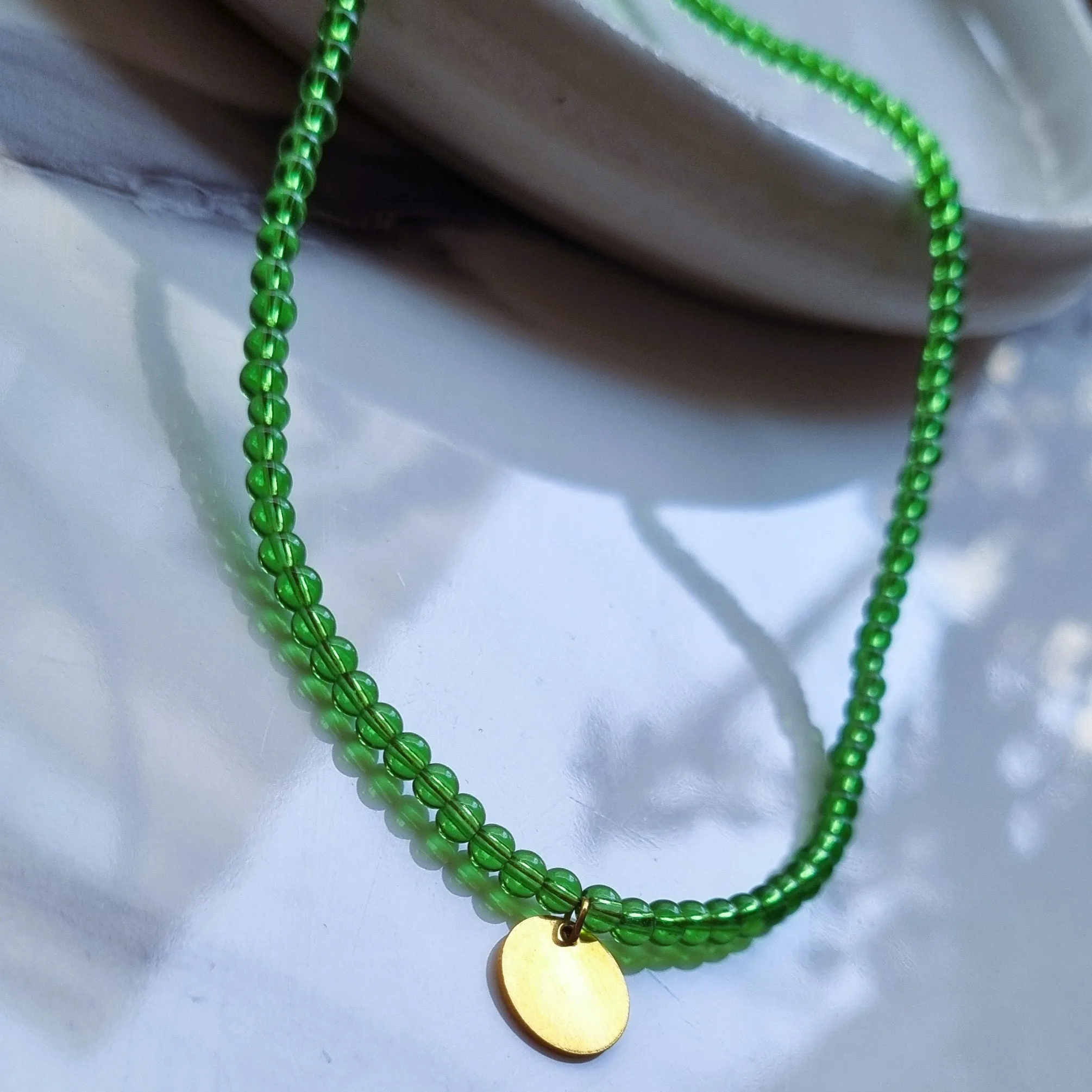 Transparent green beads necklace